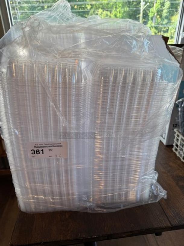 Clear plastic takeout trays bundle, wrapped, labeled "361," multiple stacks, new condition, suitable for food service.