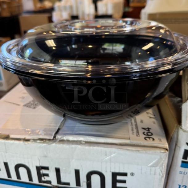 Disposable 12" black salad bowl with clear lid on packaging, stack of two. Suitable for catering or takeaway use.