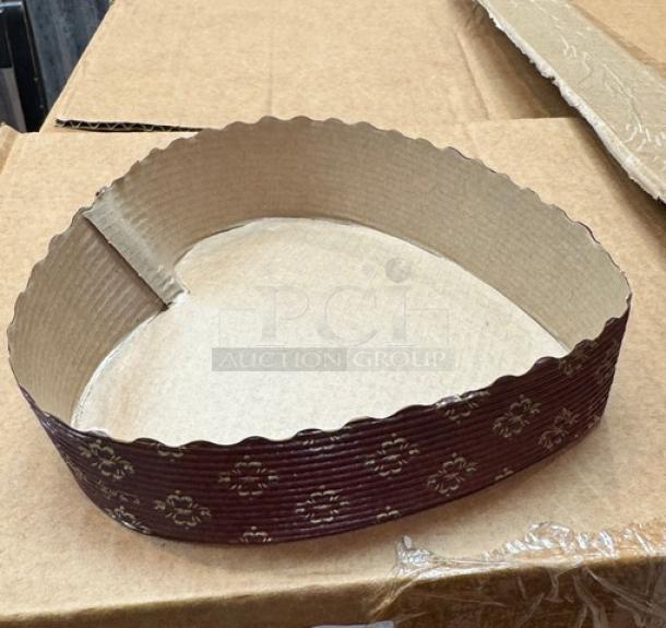 Heart-shaped disposable baking mold, paper material with floral pattern. New condition; ideal for baking, party use.