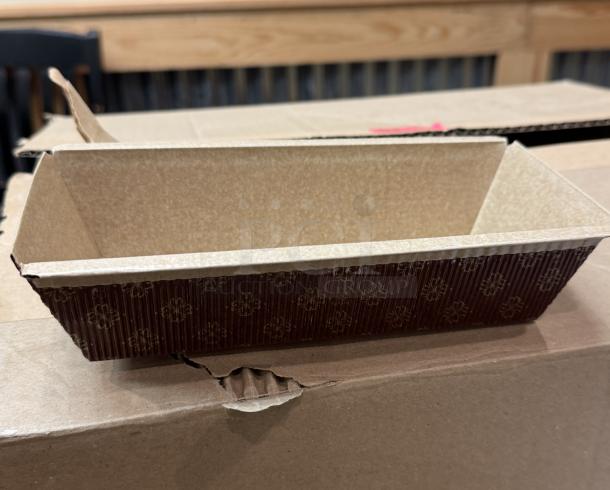 Disposable loaf pan with floral pattern, made of sturdy paper material. Brown exterior, beige interior. Good condition.