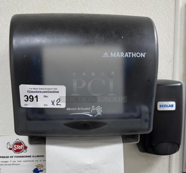Marathon Paper Towel Dispenser, wall mounted, motion-activated, Ecolab label, black finish, includes two units for auction.