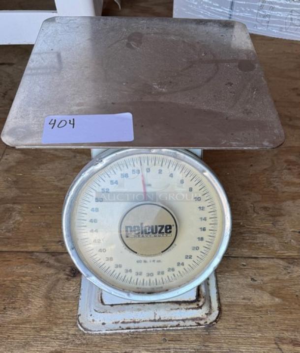 Pelcuze Heavy Duty Scale, stainless steel, analog dial, used condition, visible surface wear, marked "404".