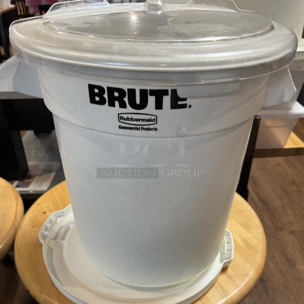Rubbermaid Brute 10 Gal dry storage container with sliding lid, labeled, durable white plastic, commercial use.