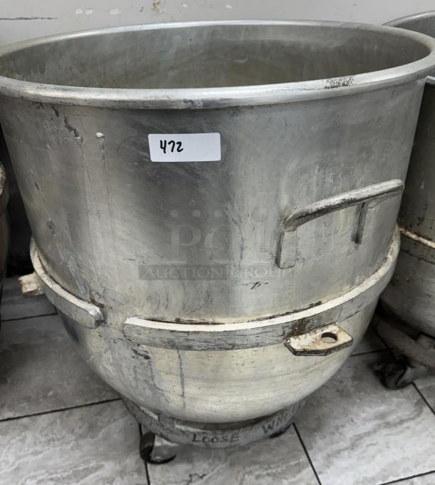 128 Qt. stainless steel mixing bowl with dollie, signs of wear, label marked "472," mounted on casters for mobility.