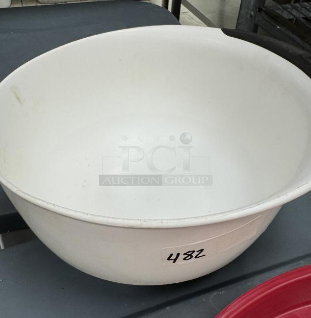 Large white mixing bowl with minor scuffs. Item number 482 label affixed. Sturdy and spacious for various mixing tasks.