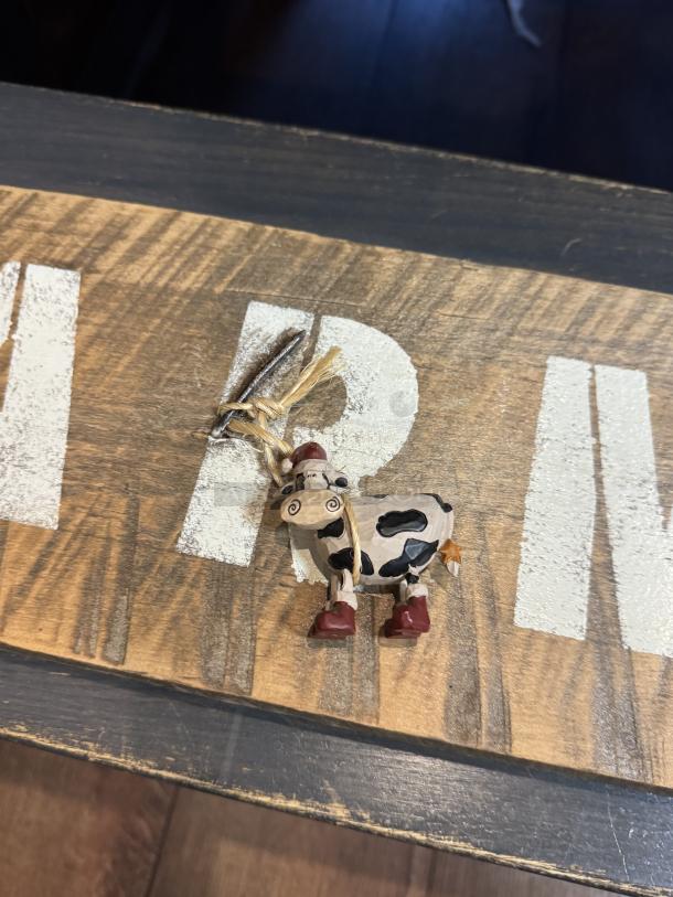 Farm Fresh wooden sign with rustic finish and whimsical cow figure. Light wear, suitable for kitchen or farmhouse decor.