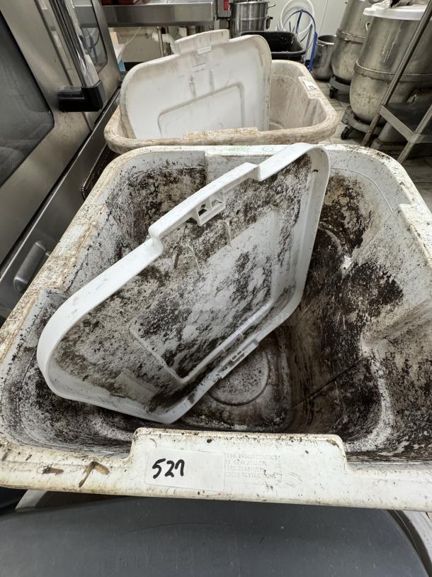 Rubbermaid 40 Gal dry storage container, heavily stained, white, item number 527 visible, used condition.
