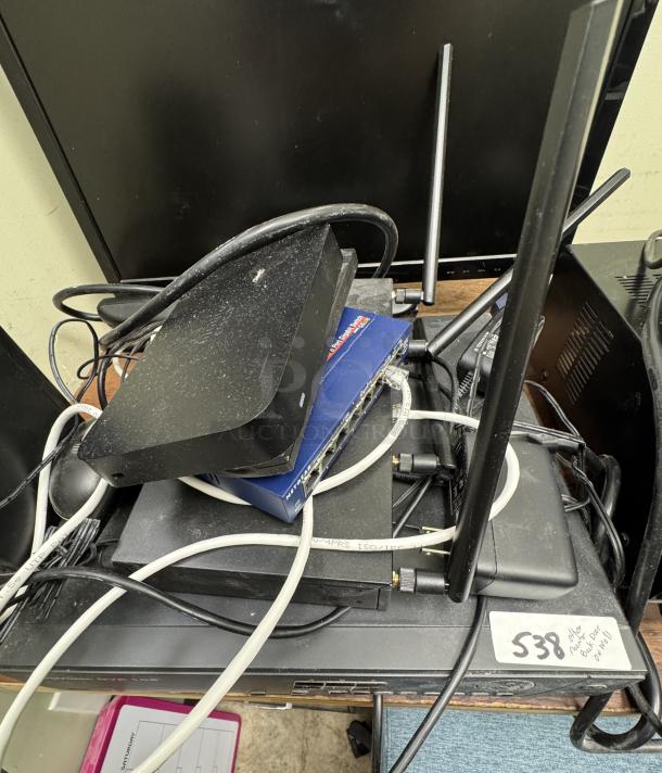 TruVision security system with multiple wiring setups, surge protection boxes, and two back door monitors, in tested working condition.