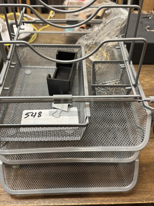 Metal desk organizer with mesh tray and baskets, new condition, includes label showing number 548.