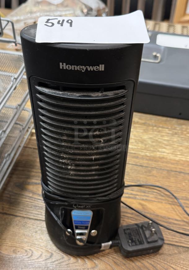 Honeywell fan, black, tested and working, with power and noise settings visible. Model QVS. Auction tag labeled 549.