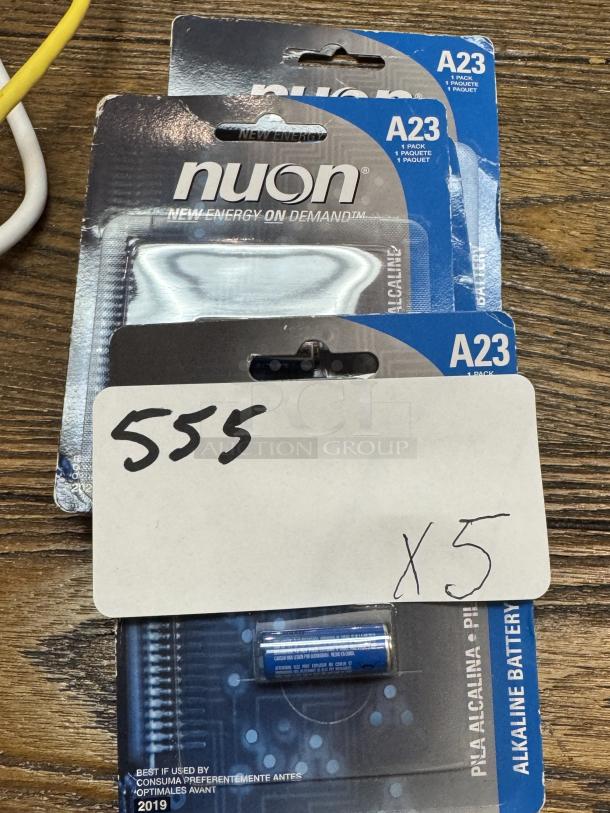 Nuon A23 batteries, 5 packs, sealed in original packaging. Labeled "New Energy on Demand." Expiry: 2019.
