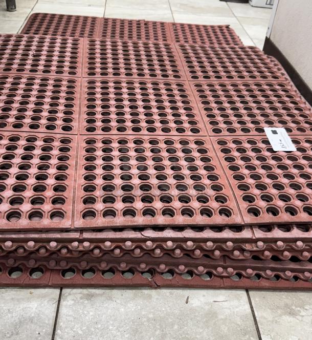 Red floor mats, 3'x3' and 5'x3', with perforated design. Suitable for industrial or kitchen use. Excellent condition.