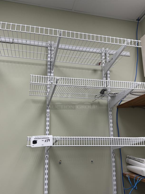 Wall mount wire shelving with brackets, white finish, three-tier design, auction tag indicating item number 558.