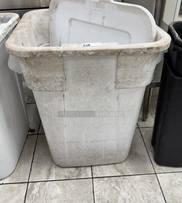 Rubbermaid 40 Gal dry storage container, white, visibly worn and stained, with a numbered label "528" on top edge.