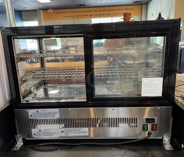 Atosa Refrigerated Display Case, lightly used, 3 glass shelves, stainless steel base, visible power switch, tested and working.