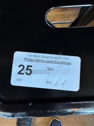 Set of 4 black metal stools, robust design, marked lot 25 for auction. Visit PCAuctions.com/Carolinas for more details.