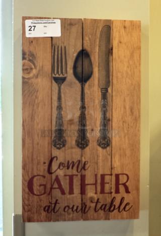 Wooden decorative picture with vintage silverware design and the phrase "Come Gather at Our Table." Auction tag visible.