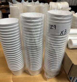 Stacks of 16 oz Styrofoam cups wrapped in plastic, labeled "29 x3," ready for auction bid. Perfect condition.