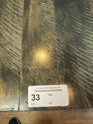 Amish made dining table with bench seats, dark wood grain finish, visible label reading "PC1auctions.com/Carolinas".