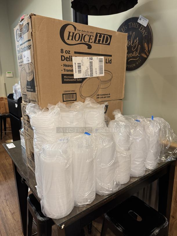 8 oz Choice HD deli containers with lids, packed in cardboard boxes. Includes 240 containers and lids per case. New condition.