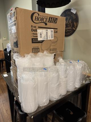8 oz Choice HD deli containers with lids, packed in cardboard boxes. Includes 240 containers and lids per case. New condition.