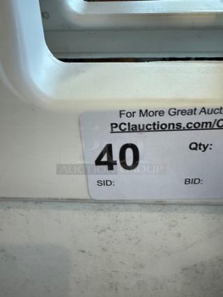 Signature Deluxe Portable Advertising Sign with visible tag showing auction details, suitable for indoor and outdoor use.