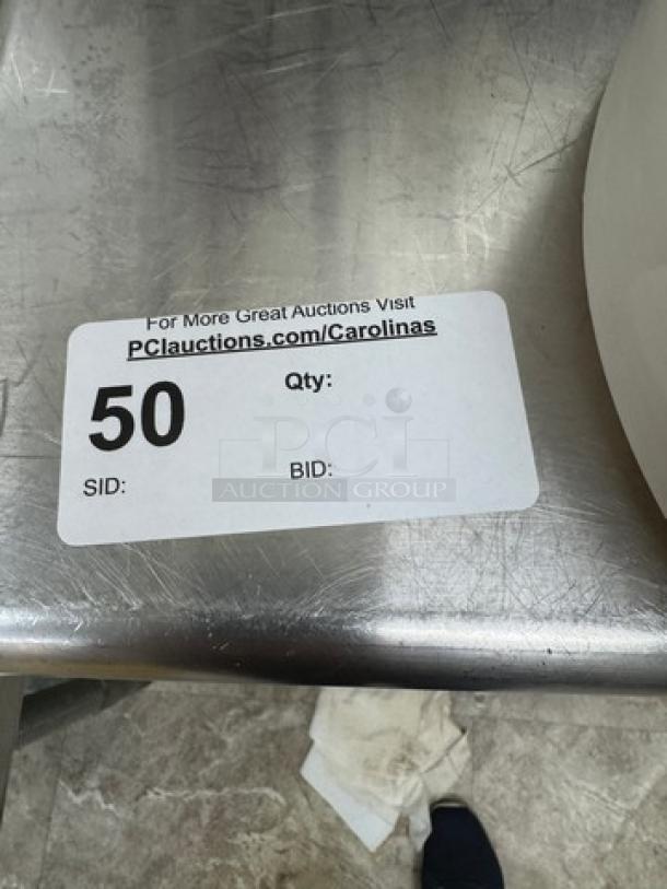 Equipment stand with drawer and galvanized shelf on casters, stainless steel finish. Auction label with lot number 50.