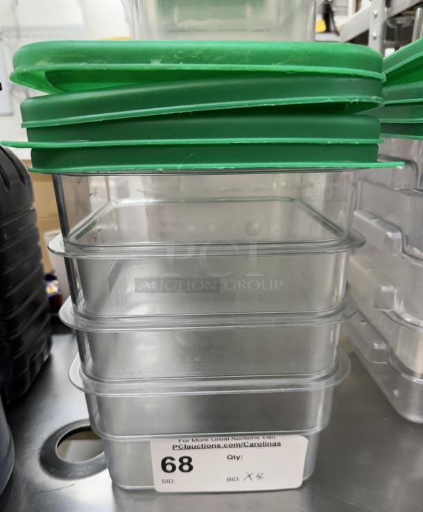 Cambro square plastic containers with green lids, stack of four, clear material, auction lot number 68.
