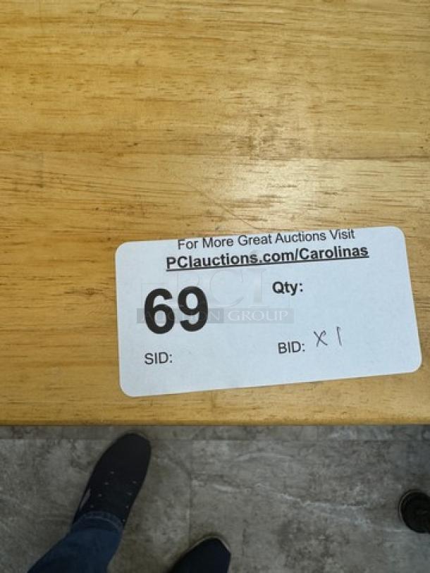 Wooden rolling display/storage cart, number 69, visible auction label suggests active bidding. Sturdy and versatile.