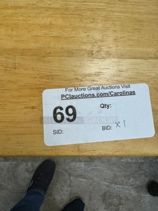 Wooden rolling display/storage cart, number 69, visible auction label suggests active bidding. Sturdy and versatile.