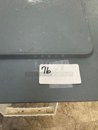 Rubbermaid 28 Gal. dry goods storage container on casters, gray lid, slight surface wear, label marked "76."