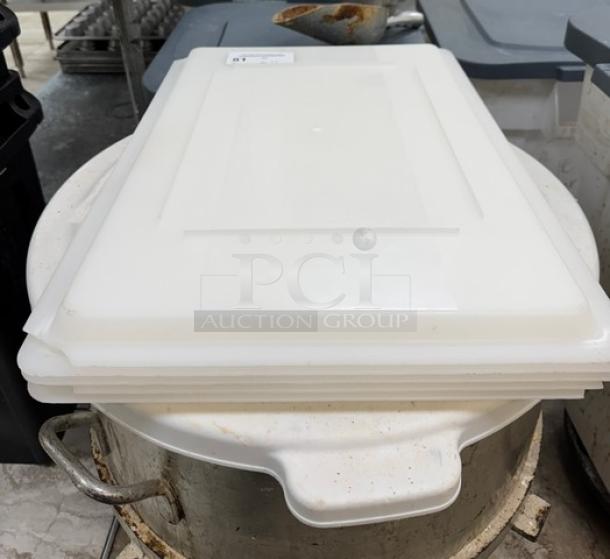 Choice plastic lids, stack of five. Durable white material. Suitable for food containers. Good condition. Auction item.