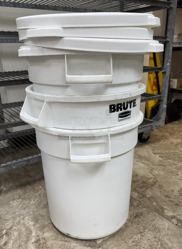 Rubbermaid Brute 10-gallon containers with lids, white, stackable, with handles, labeled "Brute" in black.