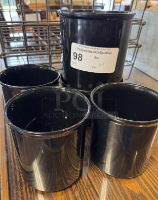Six black round plastic containers, auction tag 98, good condition.