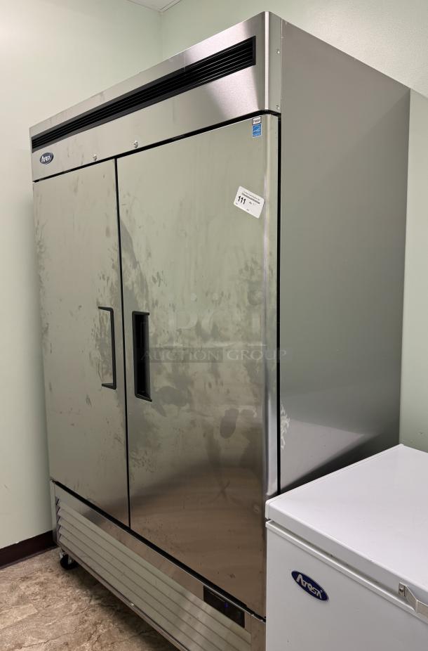 Atqsa 2 Dr. Freezer, Model #MBF8503GR, tested, working condition, 115V, 1Phase, less than 3 months old, stainless steel.