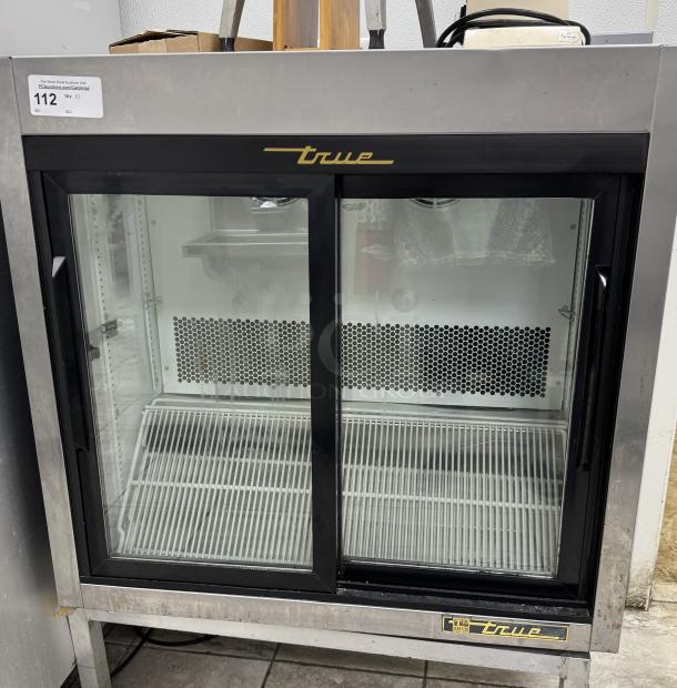 True Refrigerated Display Case TSD-09G-LD, glass front, stainless frame, tested and working, Model #TSD-09G-LD.