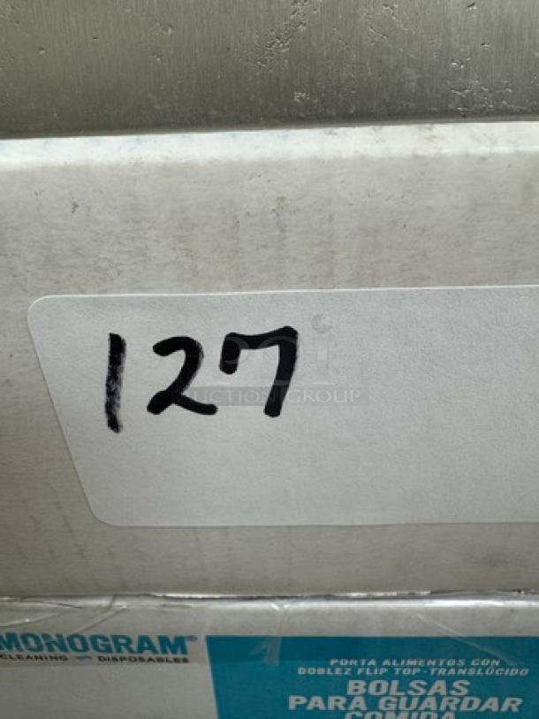 Sustainable Temporary Sealable Portion Bags with holder packaging, labeled "127," Monogram brand, in good condition.