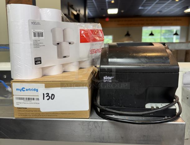 Star SP700 Receipt Printer with 4 ribbon cartridges and 7 rolls of paper; good condition, includes power cable.