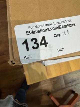 Partial boxes of Salt & Pepper and Texas Pete. Auction label showing item number 134 on cardboard packaging.