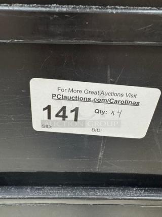 Rubbermaid 23 Gal. containers set of 4. Visible auction tag with lot number 141. Black durable material.