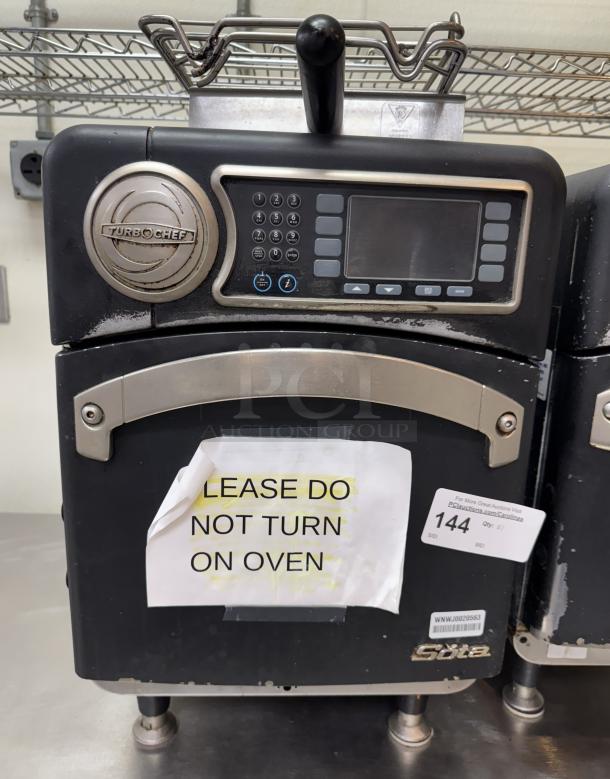 Turbo Chef Sota Oven for parts, black, no turn on notice, control panel, and brand name visible. Used condition.