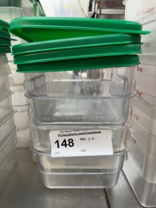 Cambro Square 2 Qt. Containers with green lids, 4-piece set. Includes auction tag labeled "148." Clear and stackable design.
