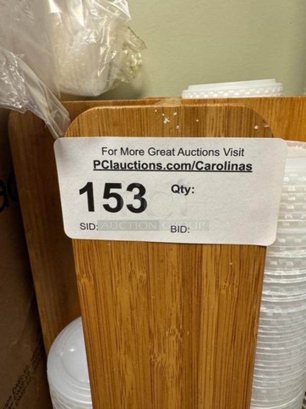 Pepsi cups with lids, wooden lid holder, wooden cup holder, and 5 sleeves of cups. Auction tag: "For More Great Auctions Visit PCAuctions.com/Carolinas, SID: 153."