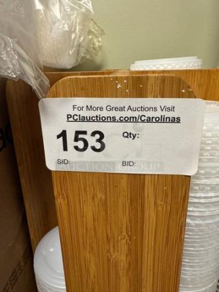 Pepsi cups with lids, wooden lid holder, wooden cup holder, and 5 sleeves of cups. Auction tag: "For More Great Auctions Visit PCAuctions.com/Carolinas, SID: 153."