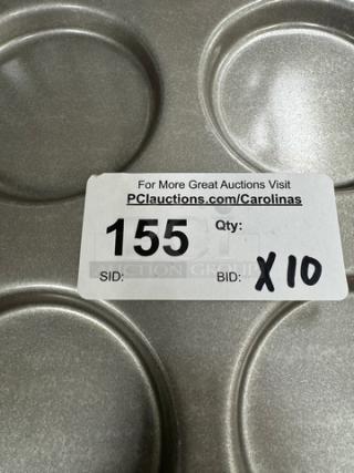 Chicago Metallic cookie sheets, lot of 10, each with 12 cup capacity. Auction tag reads "SID: 155, BID: X10."
