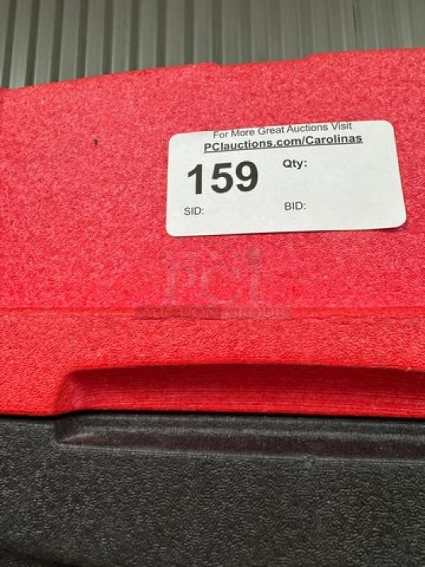 Red and black Portable Metro Cooler with auction tag. Tag shows lot number 159. Durable material, suitable for events.