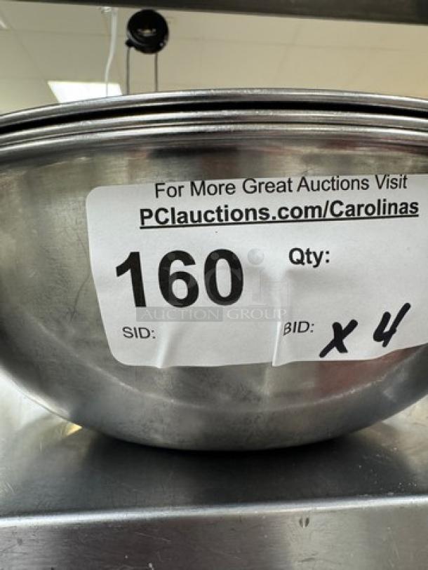 Set of four stainless steel mixing bowls in good condition, auction tag reads "160, Qty: x 4".