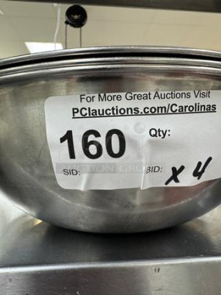 Set of four stainless steel mixing bowls in good condition, auction tag reads "160, Qty: x 4".