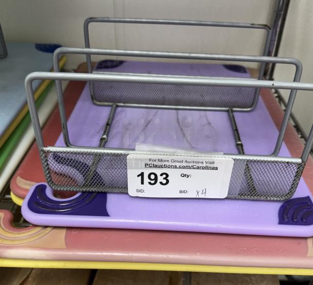 Cutting boards with metal rack, includes one 12x18 and two 15x20 boards. Auction tag visible, item number 193.