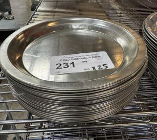 Stack of metal pie pans, 25 total, on wire shelf. Label indicates auction item number 231, bid quantity x25.